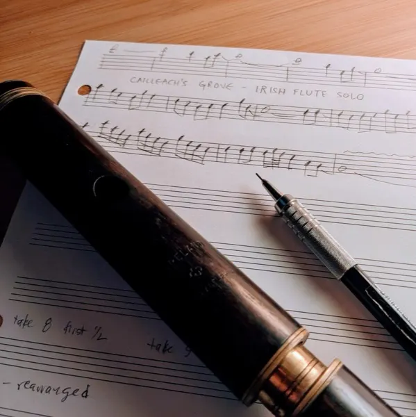 Irish flute resting on sheet music